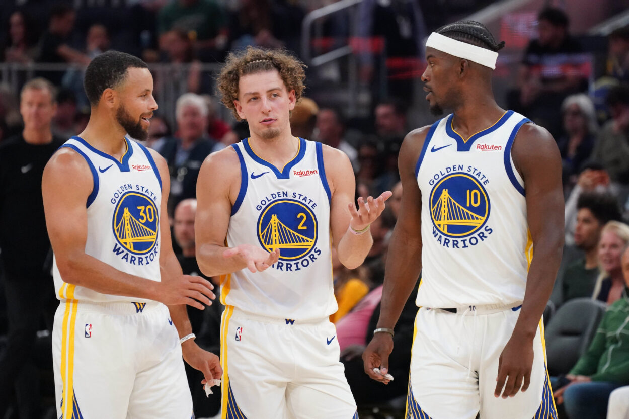 Brandin Podziemski, jummy butler, Stephen Curry, NBA: Preseason-Los Angeles Lakers at Golden State Warriors