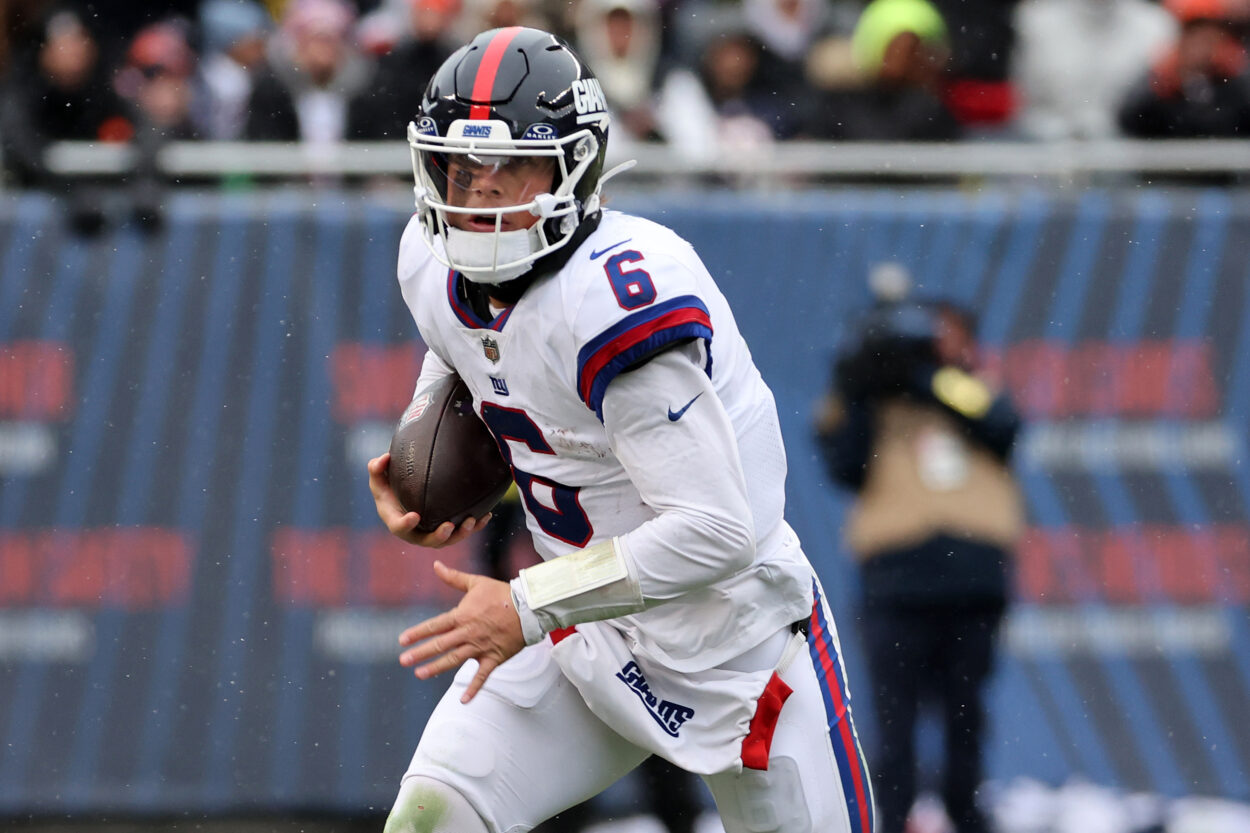 Nov 9, 2025; Chicago, Illinois, USA; New York Giants quarterback Jaxson Dart (6) rushes the ball against the Chicago Bears during the second half at Soldier Field. Mandatory Credit: Mike Dinovo-Imagn Images